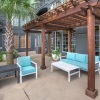 Large outdoor patio adjacent to the pool 